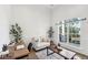 Bright home office with large windows, providing a tranquil space for work and relaxation at 9435 Grande Dr, Winston, GA 30187