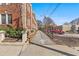 Exterior of building with sidewalk and parking in rear, showing brick facade at 733 Frederica Ne St # 7, Atlanta, GA 30306