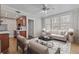 Cozy living room featuring hardwood floors, large windows, and an open kitchen at 733 Frederica Ne St # 7, Atlanta, GA 30306