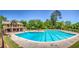 Enjoy this community pool with a two-story clubhouse and sundeck for relaxing poolside on a sunny day at 394 Teal Ct, Roswell, GA 30076