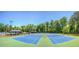These community tennis courts offer a space for friendly competition and a clubhouse with an entertainment area at 394 Teal Ct, Roswell, GA 30076