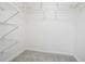 Spacious walk-in closet with wire shelving, perfect for organization and storage at 394 Teal Ct, Roswell, GA 30076