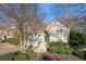 Charming home with a well-manicured front yard and inviting entryway at 2325 Woodcrest Se Dr, Smyrna, GA 30082