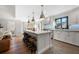 Beautiful kitchen with a large center island with seating, modern stainless steel appliances, and a door to an outdoor deck at 2325 Woodcrest Se Dr, Smyrna, GA 30082