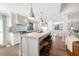 Spacious kitchen with a center island and seating, stainless steel appliances, and plenty of natural light at 2325 Woodcrest Se Dr, Smyrna, GA 30082
