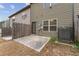 View of the back of the house featuring a small patio and fenced yard at 2783 Bayrose Cir # 83, Atlanta, GA 30344