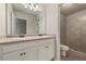 Bright bathroom featuring a double vanity with granite countertops and a tiled walk-in shower at 2783 Bayrose Cir # 83, Atlanta, GA 30344
