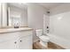 This bathroom features a tub shower combo and neutral-colored cabinets and countertops at 2783 Bayrose Cir # 83, Atlanta, GA 30344
