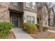 Inviting townhome entrance with well-manicured bushes and a tidy walkway at 2783 Bayrose Cir # 83, Atlanta, GA 30344