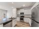 Modern kitchen featuring stainless steel appliances, granite countertops, and white cabinets at 2783 Bayrose Cir # 83, Atlanta, GA 30344