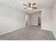This main bedroom features a ceiling fan and access to a walk-in closet and bathroom at 2783 Bayrose Cir # 83, Atlanta, GA 30344