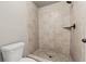 This shower features tile walls and bronze fixtures at 2783 Bayrose Cir # 83, Atlanta, GA 30344