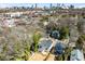 Aerial view of a newly constructed home nestled among mature trees, offering a blend of city and suburban living at 61 Newcastle Sw St, Atlanta, GA 30314