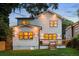 This backyard boasts a well-maintained lawn, wood fence, and a charming deck perfect for entertaining at 61 Newcastle Sw St, Atlanta, GA 30314