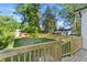 Backyard view of the wooden fence enclosing the yard of the home on a sunny day at 61 Newcastle Sw St, Atlanta, GA 30314
