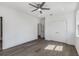 Spacious bedroom featuring hardwood floors, a ceiling fan, recessed lighting, and double door closet at 61 Newcastle Sw St, Atlanta, GA 30314