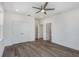 Well-lit bedroom with wood floors, recessed lighting, and a double door closet at 61 Newcastle Sw St, Atlanta, GA 30314