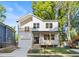Charming two-story new construction home with a welcoming front porch and a one car garage at 61 Newcastle Sw St, Atlanta, GA 30314
