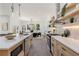 Bright and airy kitchen with quartz countertops, stainless appliances, and eat-in dining area at 61 Newcastle Sw St, Atlanta, GA 30314