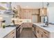 Modern kitchen featuring stainless steel appliances, quartz countertops, light wood cabinets, and hardwood floors at 61 Newcastle Sw St, Atlanta, GA 30314