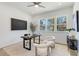 Home office with large windows, hardwood floors, and contemporary furnishings at 61 Newcastle Sw St, Atlanta, GA 30314