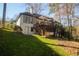 Home backyard features stairs and pergola at 1190 Saint Ives Ct, Suwanee, GA 30024