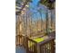 Home features backyard with trees and a patio with nice trellis work at 1190 Saint Ives Ct, Suwanee, GA 30024