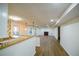 Open-concept basement with a stylish kitchen and cozy fireplace at 1190 Saint Ives Ct, Suwanee, GA 30024