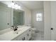 Bathroom with good natural light, marble flooring and a large vanity at 1190 Saint Ives Ct, Suwanee, GA 30024