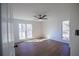 Inviting bedroom with lots of natural light and gleaming hardwood floors at 1190 Saint Ives Ct, Suwanee, GA 30024