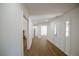 Entryway with hardwood floors and white molding, trim and painted walls at 1190 Saint Ives Ct, Suwanee, GA 30024