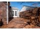 Wooden deck with brick exterior with lattice railing, perfect for outdoor entertaining at 1251 Cumberland Ne Rd, Atlanta, GA 30306