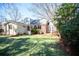 Spacious backyard with lawn and wooden deck, ideal for outdoor activities and entertaining at 1251 Cumberland Ne Rd, Atlanta, GA 30306