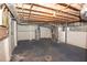 Spacious unfinished basement with concrete floor and exposed ductwork and utilities at 1251 Cumberland Ne Rd, Atlanta, GA 30306
