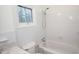 Clean bathroom featuring a shower-tub combination, toilet, and natural light from window at 1251 Cumberland Ne Rd, Atlanta, GA 30306