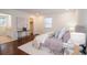 Bedroom features hardwood floors, walk in closet, and ensuite bathroom at 1251 Cumberland Ne Rd, Atlanta, GA 30306