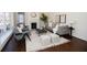 Bright living room features a fireplace, large windows, and stylish furniture at 1251 Cumberland Ne Rd, Atlanta, GA 30306