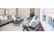 Bright living room features large windows and stylish furniture at 1251 Cumberland Ne Rd, Atlanta, GA 30306