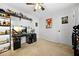 Bedroom featuring ceiling fan, closet, and modern shelving at 3730 N Quail Dr, Douglasville, GA 30135