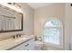 The bathroom features a white vanity, single sink, and a shower/tub combination at 2690 Valvedere Dr, Brookhaven, GA 30319
