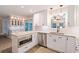 Bright kitchen featuring white cabinets, stainless steel appliances, and granite countertops at 2690 Valvedere Dr, Brookhaven, GA 30319