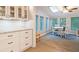 Living room and kitchen featuring great natural light and hardwood floors at 2690 Valvedere Dr, Brookhaven, GA 30319