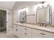 The main bathroom is equipped with a double vanity, separate room for toilet, and a walk-in shower at 2690 Valvedere Dr, Brookhaven, GA 30319