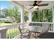 Relaxing screened-in porch with views of the lush backyard and comfortable outdoor seating at 2690 Valvedere Dr, Brookhaven, GA 30319