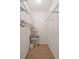 This is a walk-in closet featuring ample shelving for clothes and storage at 2690 Valvedere Dr, Brookhaven, GA 30319