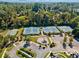 Aerial view of neighborhood amenities, including tennis courts, basketball court, and playground at 6350 Bridge Brook Ovlk, Cumming, GA 30028
