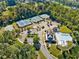 Aerial view of neighborhood amenities, including tennis courts, playground, and community pool at 6350 Bridge Brook Ovlk, Cumming, GA 30028