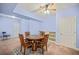 Finished basement featuring carpeted floors, a seating area with round table, and light blue walls at 6350 Bridge Brook Ovlk, Cumming, GA 30028