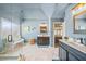 Bright bathroom with double vanities, glass shower, and modern finishes at 6350 Bridge Brook Ovlk, Cumming, GA 30028