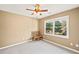Bright bedroom with a ceiling fan and lots of natural light at 6350 Bridge Brook Ovlk, Cumming, GA 30028
